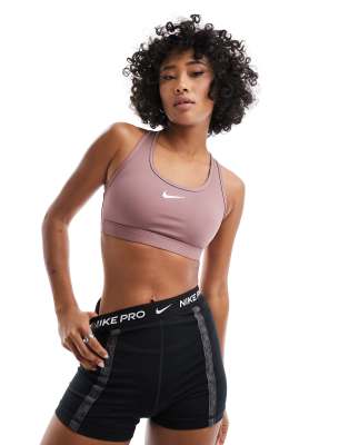 Nike Training Swoosh Dri-Fit medium support sports bra in smokey mauve-Neutral