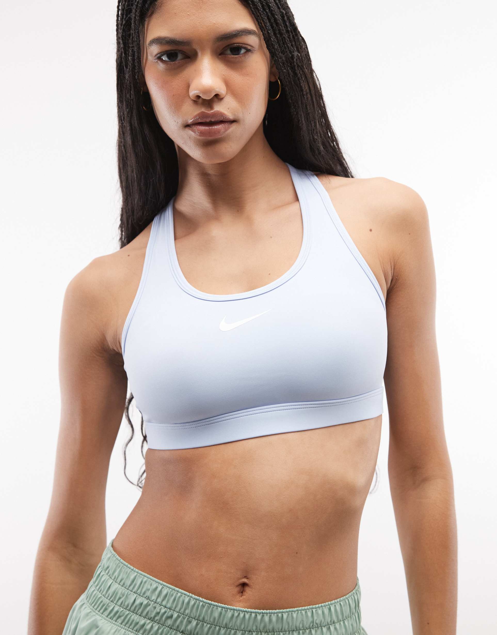 nike training swoosh essentials medium sports bra in light blue