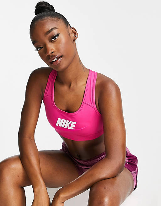  Nike Training Swoosh Futura graphic medium support sports bra in pink 