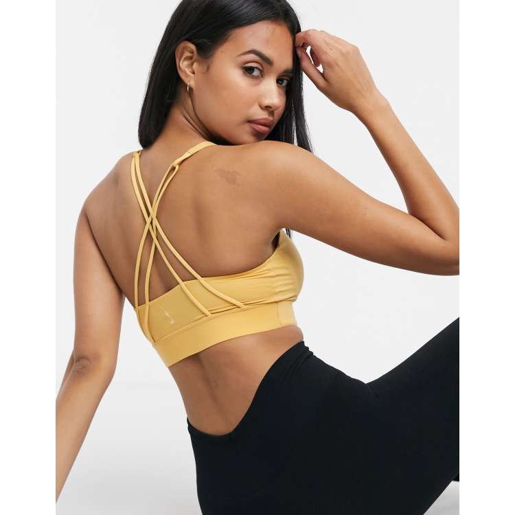 Nike training swoosh store bra in yellow