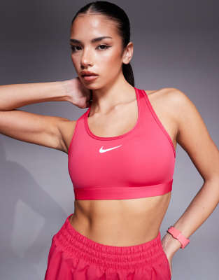 Nike Training Swoosh medium support sports bra in pink