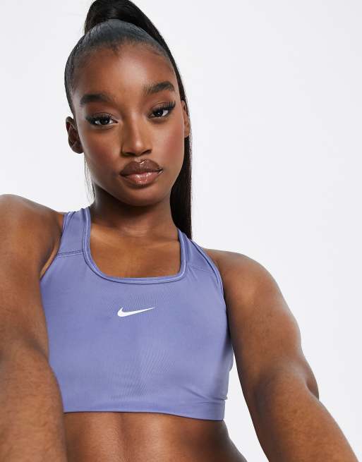 Nike Training medium support swoosh bra in black, ASOS