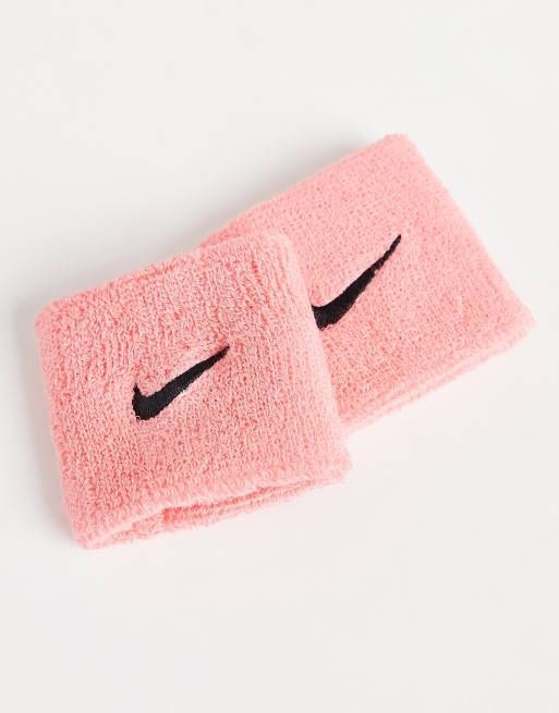 Training Swoosh unisex wristbands in pink | ASOS