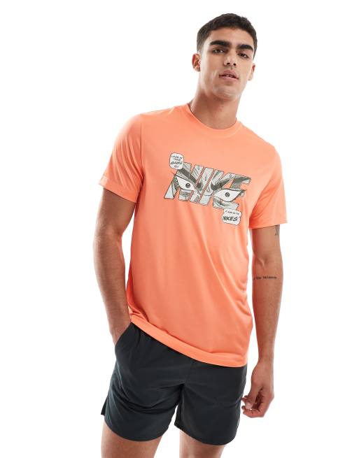 Nike Training T Shirt in Orange mit Grafik