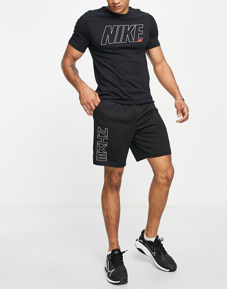 T-shirt nera con logo-Nero - Nike Training T-shirt donna  - immagine1