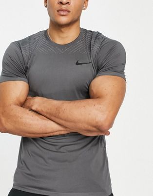 Homme Nike Training - T-shirt sans coutures en tissu Dri-FIT - Gris