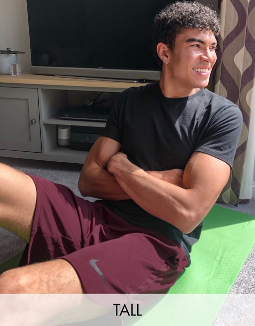 Nike Training Tall 9 inch shorts in burgundy