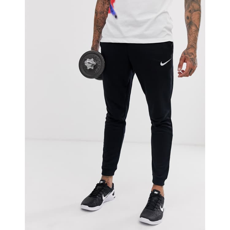 Nike Training tapered fleece pants in black ASOS