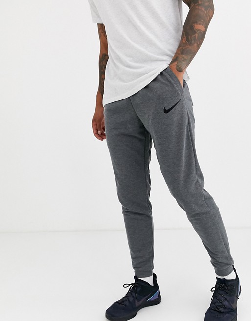 Nike Training tapered joggers in dark grey | ASOS