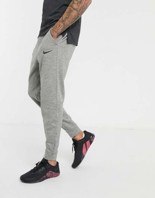 Amfibisch zaterdag Destructief Nike Training tapered joggers in grey marl | ASOS