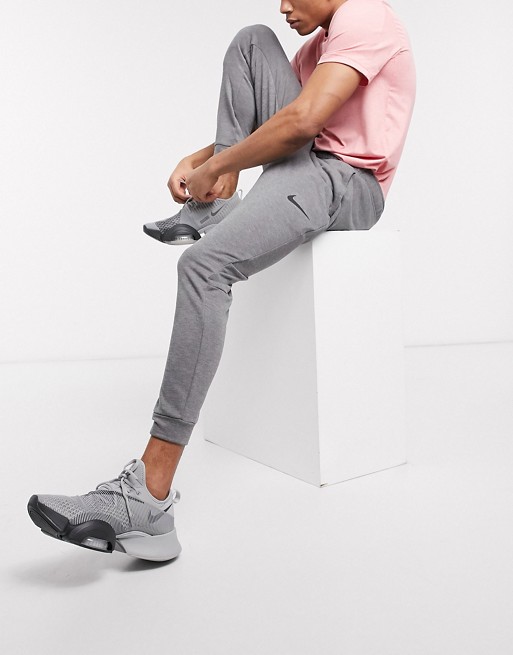 Nike Training tapered trackies in charcoal | ASOS