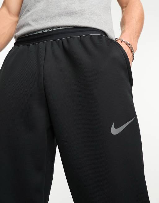 Nike spotlight best sale training pants