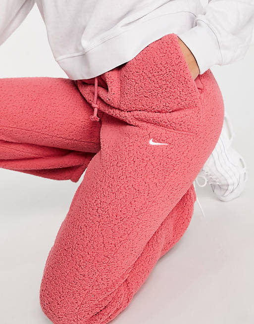 Women Nike Training Therma-FIT Cozy fleece joggers in pink 
