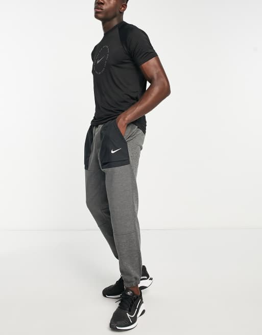 Nike training therma tapered joggers in grey sale