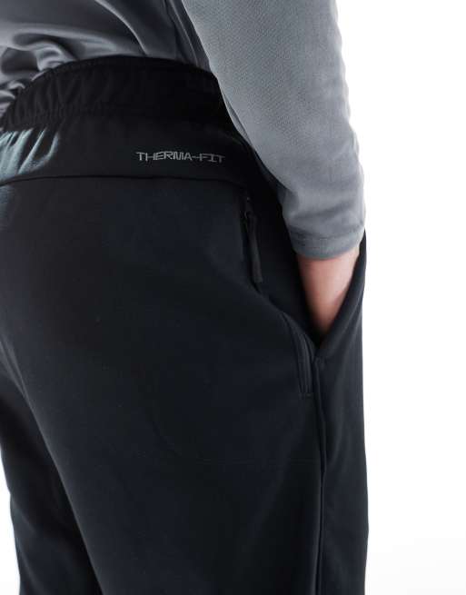 Nike Training Therma-Fit sweatpants in black | ASOS