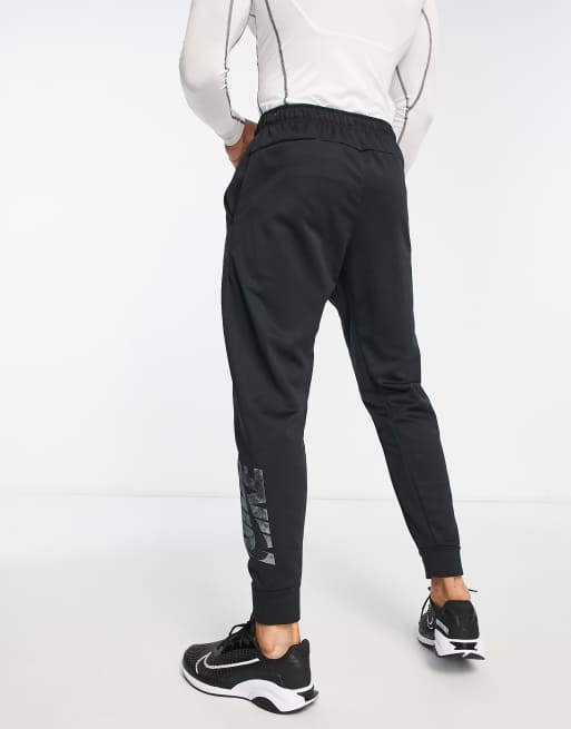 Nike training therma tapered outlet swoosh joggers in black