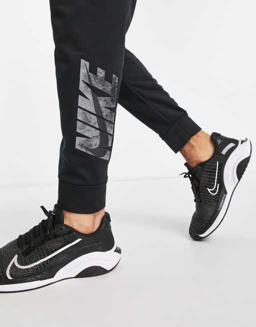 Nike training therma tapered swoosh joggers in outlet black