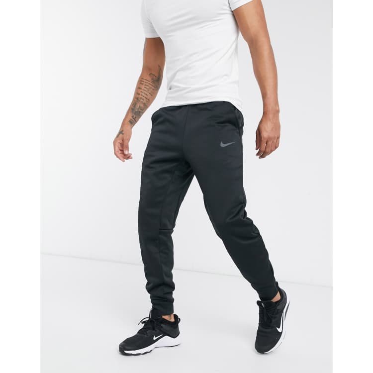 Nike Training Therma-FIT tapered cuffed sweatpants in black