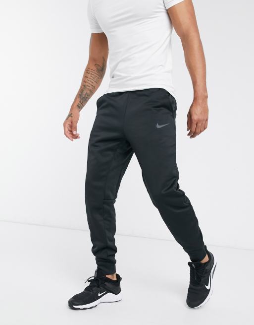 Nike Training Therma-FIT tapered cuffed sweatpants in black - BLACK