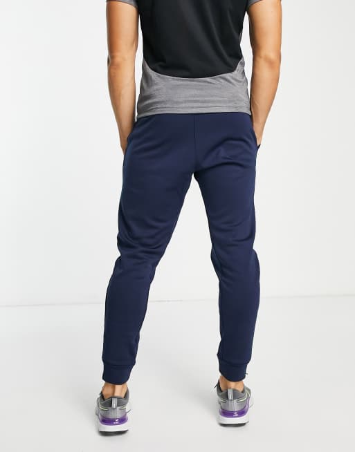 Nike Training Therma FIT tapered joggers in navy ASOS