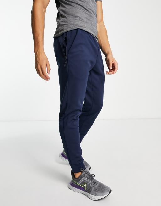 Nike Training Therma FIT tapered joggers in navy ASOS