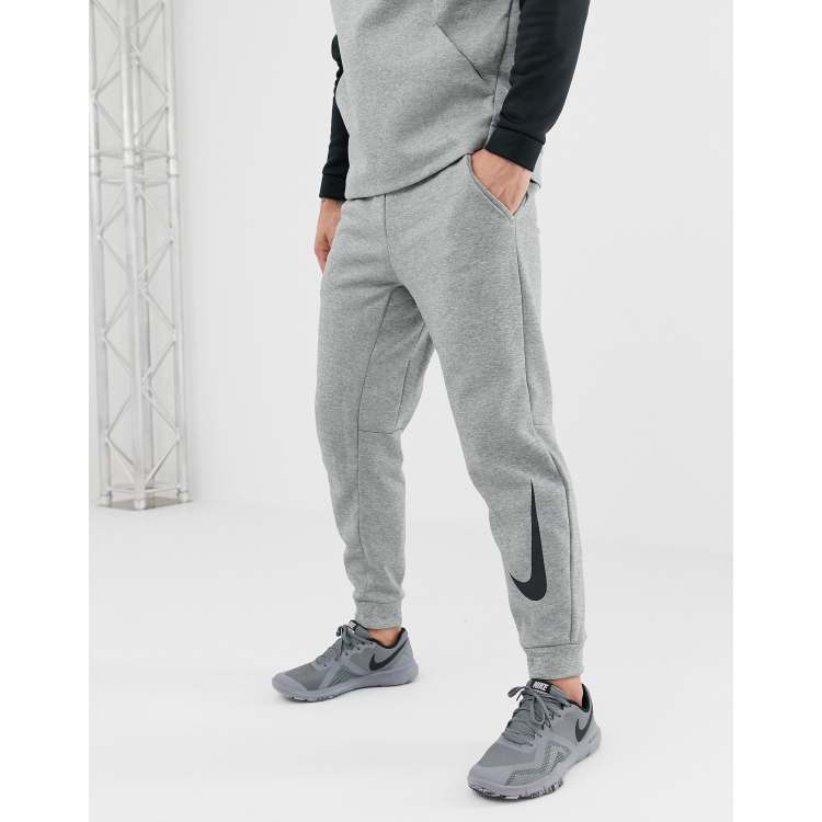 Nike Training therma joggers in grey with placement swoosh print