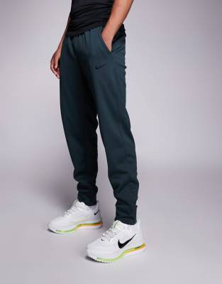 Nike Training - Therma - Pantalon fuselé - Vert
