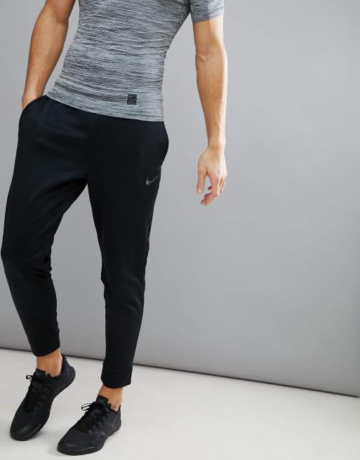 Nike training therma tapered joggers in black new arrivals