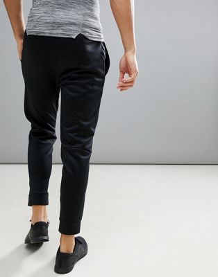nike training therma tapered swoosh joggers in black