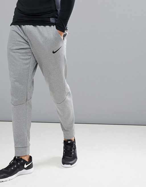 Nike Training therma tapered joggers in grey 800193-091 | ASOS