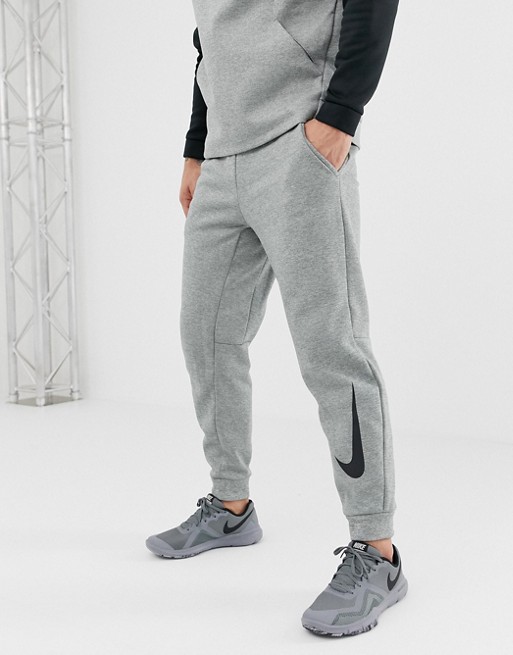 Nike Training Therma Tapered Swoosh Joggers In Grey 932257-063 | ASOS