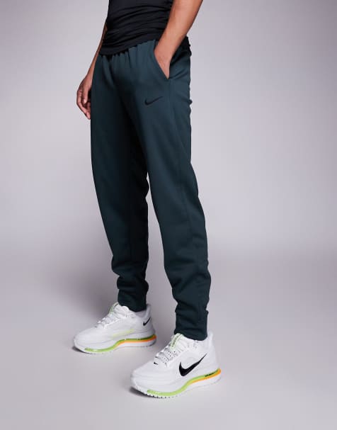 Nike Training - Therma - Toelopende broek in groen - view 1