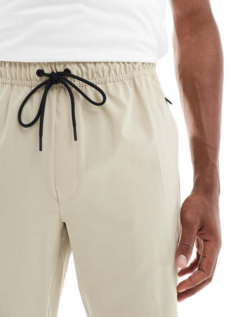 Nike Training - Unlimited - Pantalon de survêtement en tissu Dri-FIT - Beige, 5 de 5