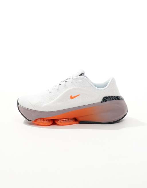 Nike Training Versair trainers in white and orange ASOS