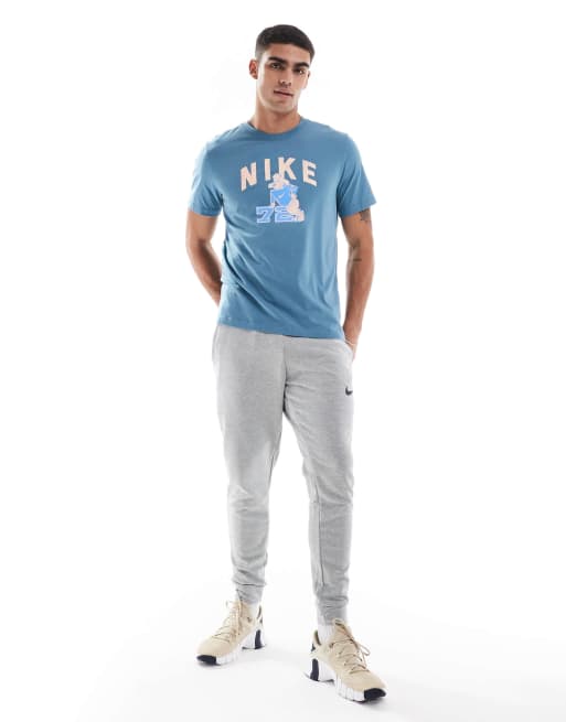 Nike Training wildcard graphic T-shirt in blue 