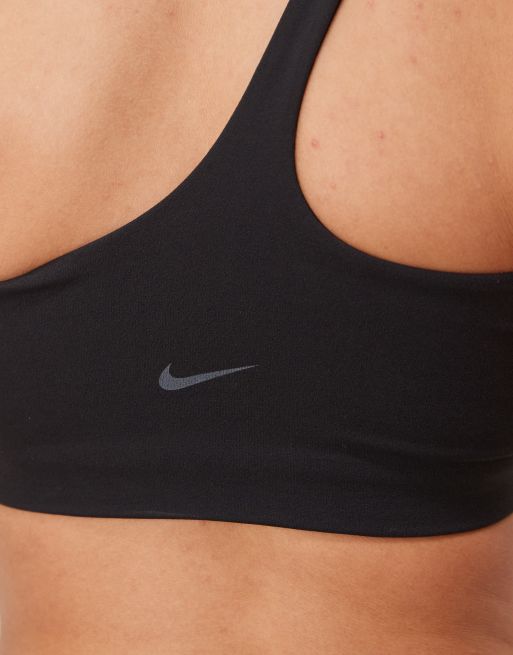 Nike Training Zenvy Dri-FIT soft touch asymmetric light support sports bra in black, 4 of 4