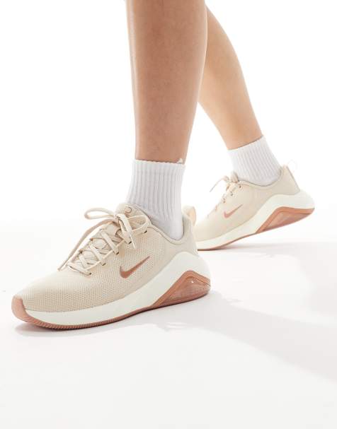 Nike Training Zoom Bella 7 trainers in pink and cream - view 1
