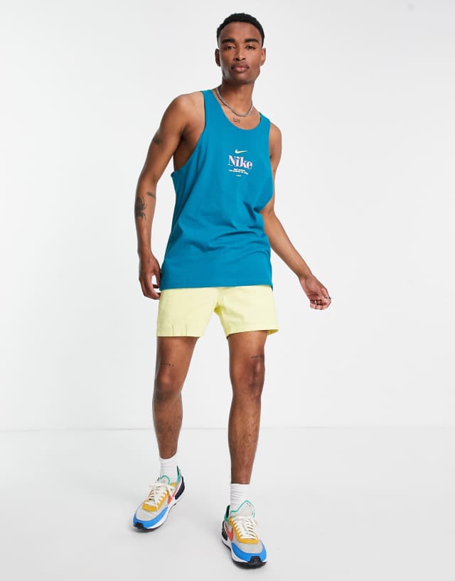 Nike Trek Division retro logo tank top in teal green