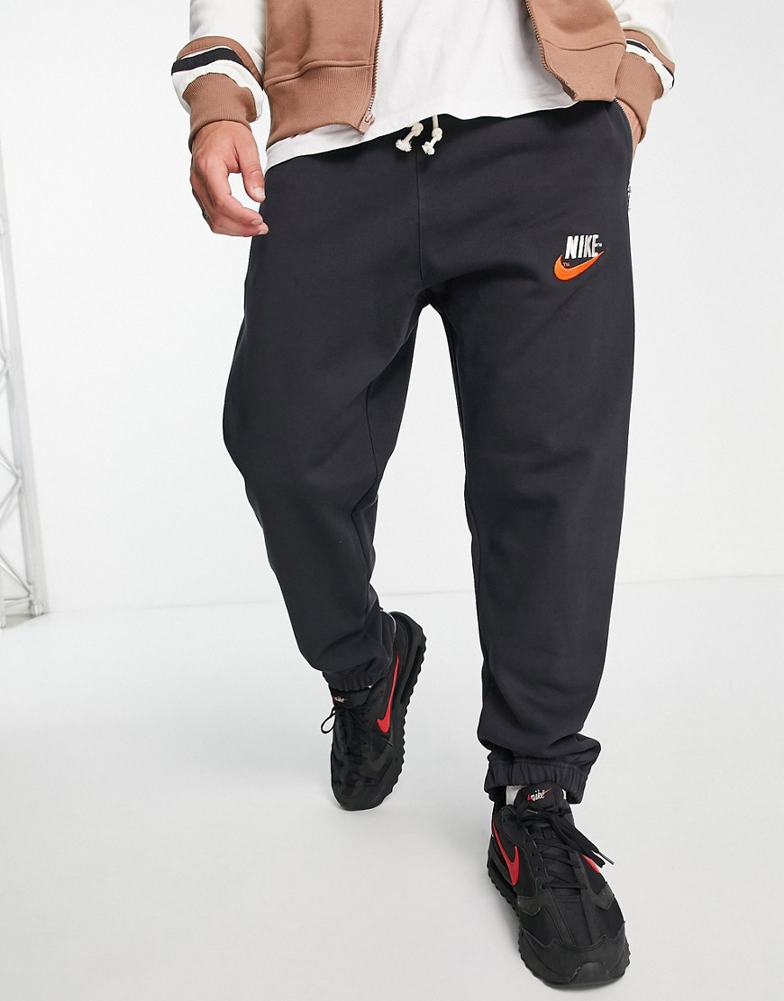 Nike Trend Fleece zip cuffed retro logo sweatpants in black - BLACK