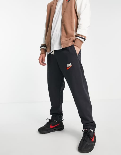 Nike Trend Fleece loose fit cuffed sweatpants in black - BLACK - ShopStyle  Pants