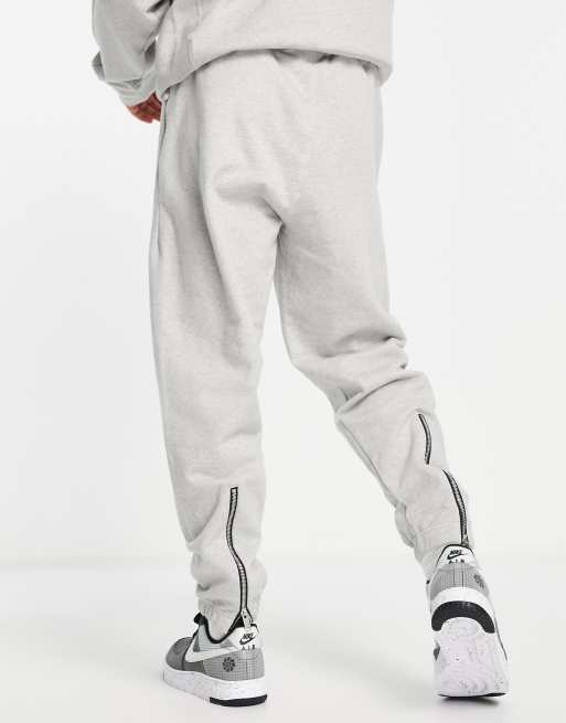 Nike sweatpants with 2025 zipper bottom