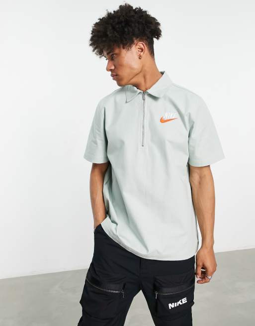 Nike store zip polo