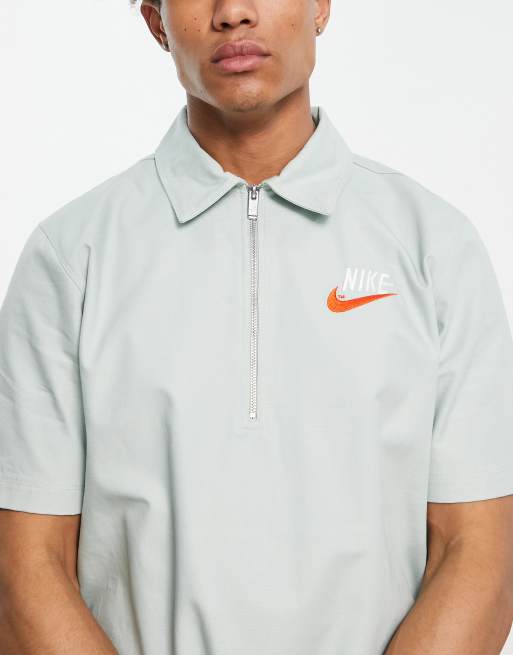 Nike store zip polo