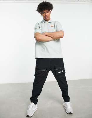 Nike Trend oversized woven half zip overshirt in seafoam | ASOS