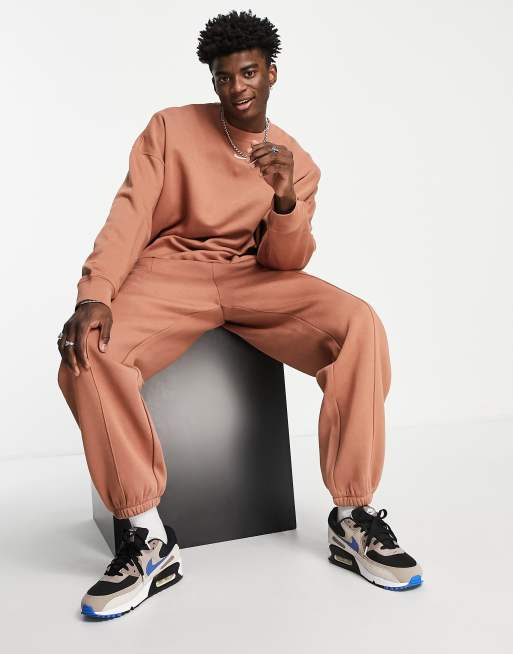 Nike oversized fleece jogger in earth brown, ASOS