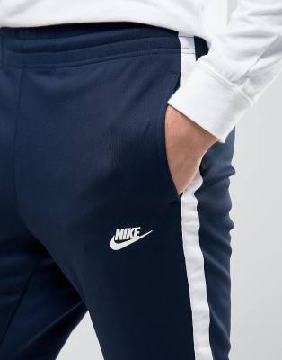 nike tribute track pants blue