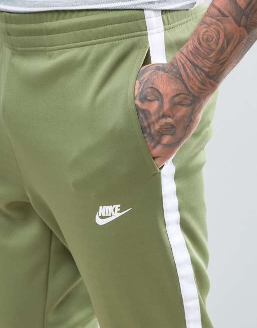 Nike tribute store track pants green