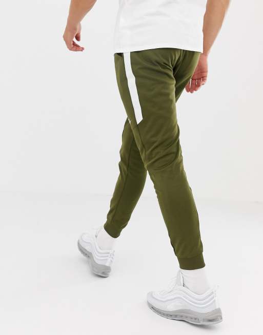 Nike tribute store joggers green