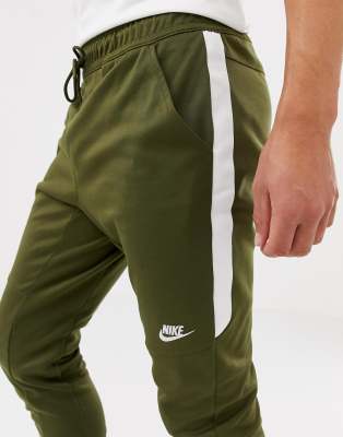 nike tribute track pants green
