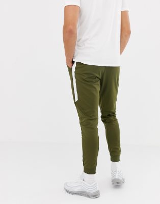 nike tribute track pants green